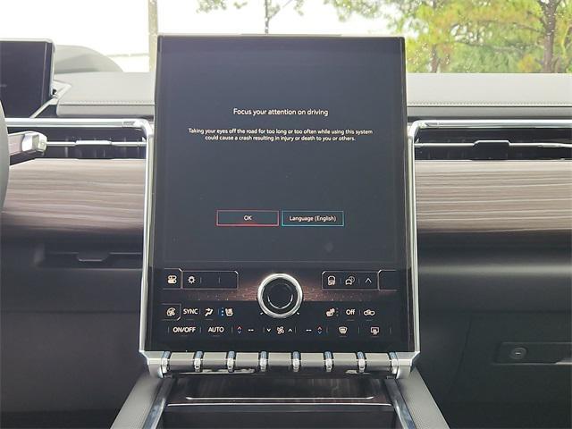 Photo of 2025 Summit White GMC Sierra EV