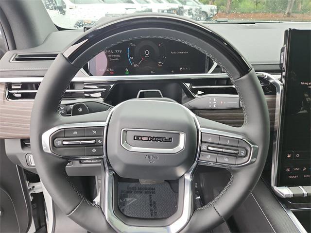 Photo of 2025 Summit White GMC Sierra EV