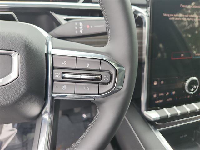 Photo of 2025 Summit White GMC Sierra EV