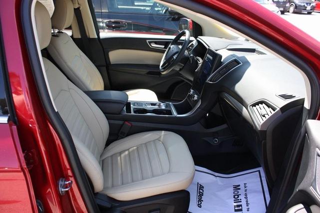 Photo of 2024 Rapid Red Metallic Tinted Clearcoat Ford Edge