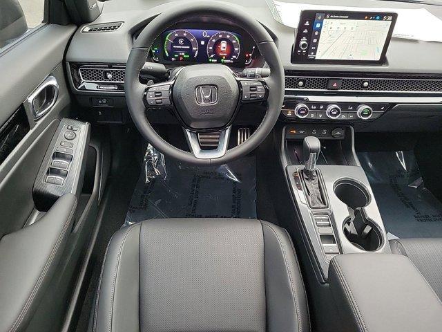 Photo of 2025 Platinum White Pearl Honda Civic Hybrid