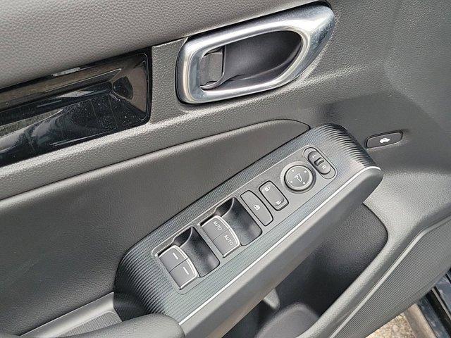 Photo of 2025 Platinum White Pearl Honda Civic Hybrid