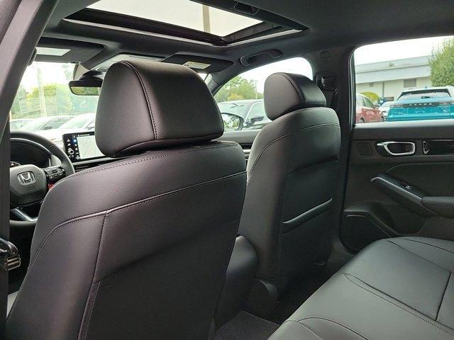 Photo of 2025 Platinum White Pearl Honda Civic Hybrid