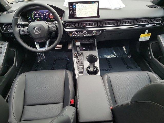 Photo of 2025 Platinum White Pearl Honda Civic Hybrid