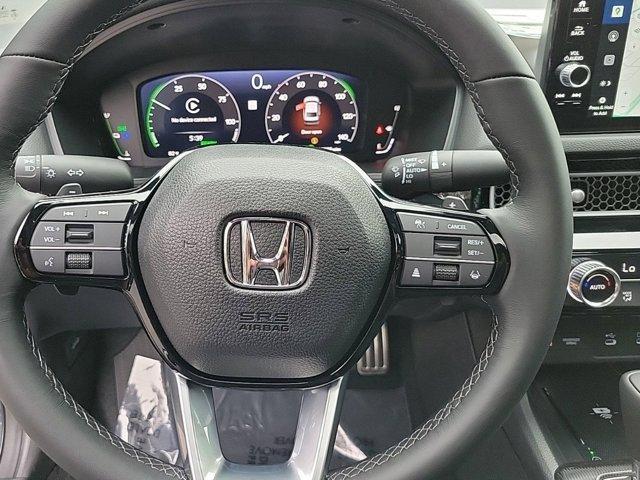 Photo of 2025 Platinum White Pearl Honda Civic Hybrid