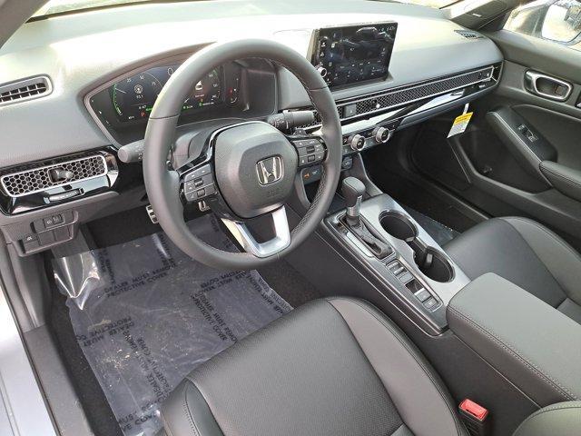 Photo of 2026 Solar Silver Metallic Honda Civic Hybrid