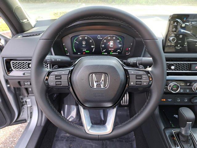 Photo of 2026 Solar Silver Metallic Honda Civic Hybrid