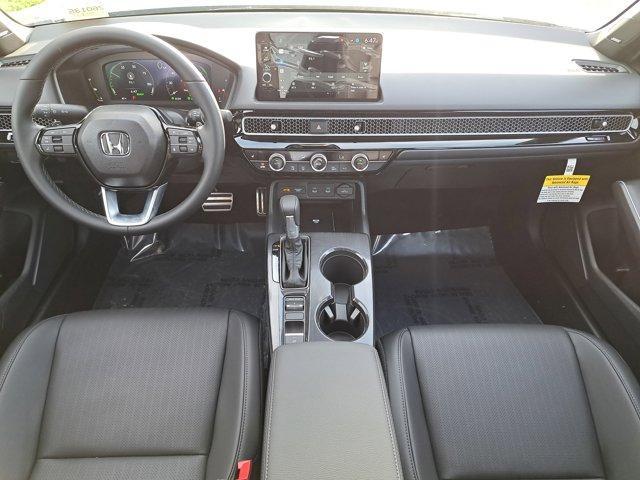 Photo of 2026 Solar Silver Metallic Honda Civic Hybrid