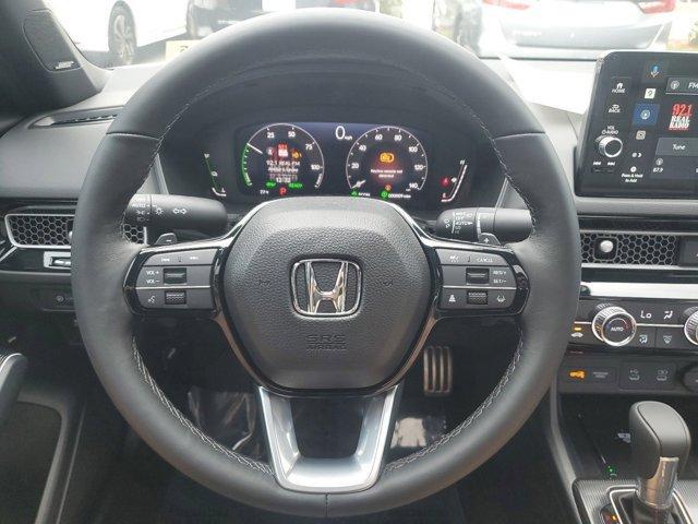 Photo of 2025 Platinum White Pearl Honda Civic Hybrid