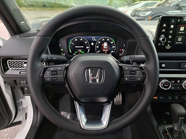 Photo of 2026 Platinum White Pearl Honda Civic Hybrid