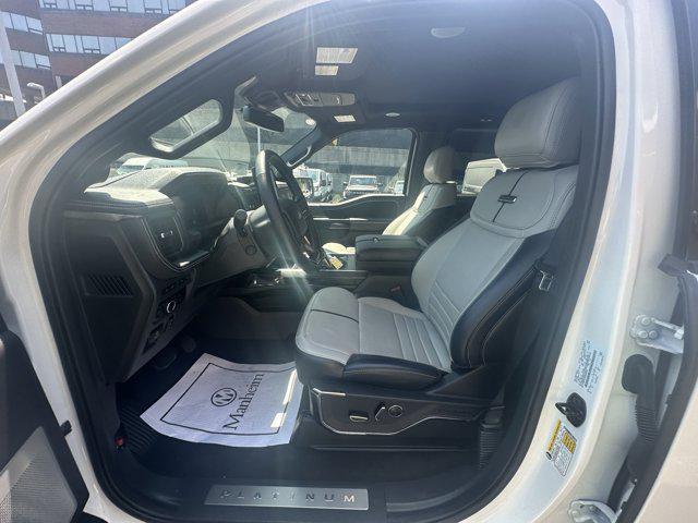 Photo of 2024 Star White Metallic Tri-Coat Ford F-150 Lightning