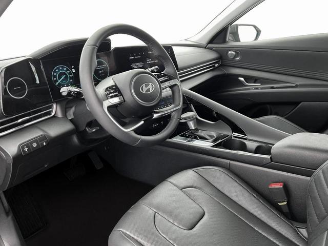 Photo of 2025 Red / Black Hyundai ELANTRA HEV