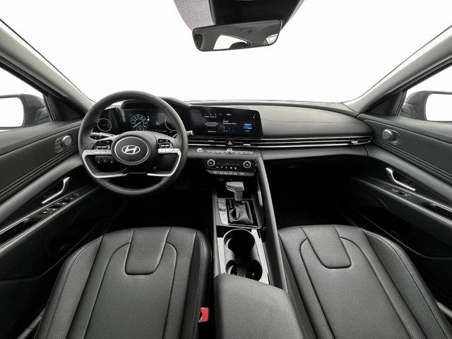 Photo of 2025 Red / Black Hyundai ELANTRA HEV