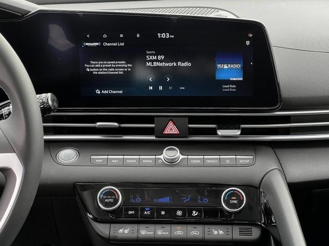 Photo of 2025 Red / Black Hyundai ELANTRA HEV