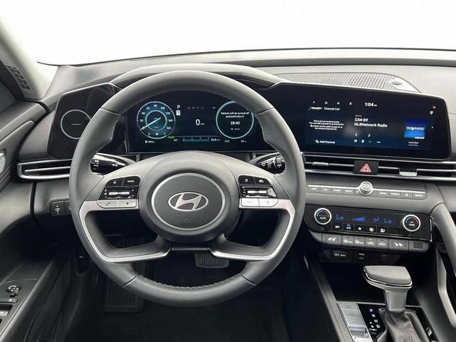 Photo of 2025 Red / Black Hyundai ELANTRA HEV