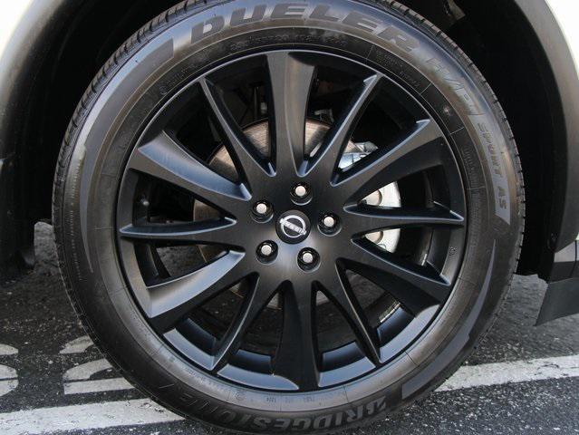 Photo of 2024 Pearl White Tricoat Nissan Murano