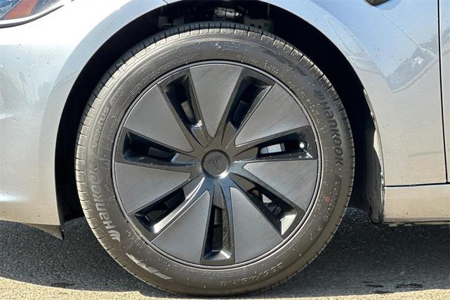 Photo of 2025 Stealth Grey Tesla Model 3