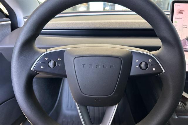 Photo of 2025 Stealth Grey Tesla Model 3