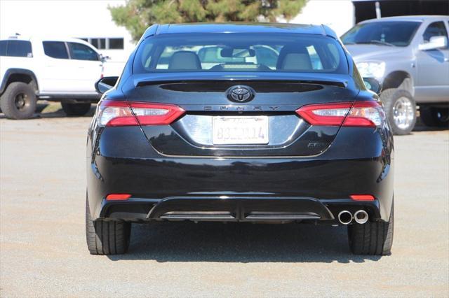 Photo of 2018 Midnight Black Metallic Toyota Camry