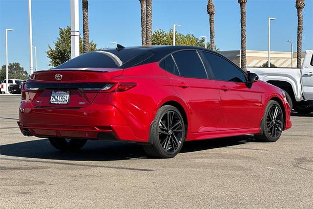 Photo of 2025 Supersonic Red/Midnight Black Metallic Toyota Camry