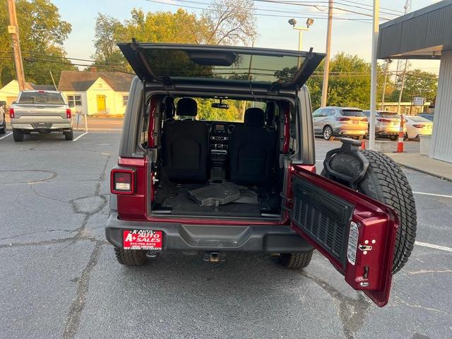 Photo of 2021 Snazzberry Pearlcoat Jeep Wrangler