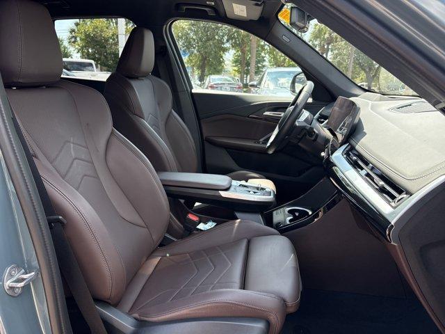 Photo of 2024 Green Metallic BMW X1