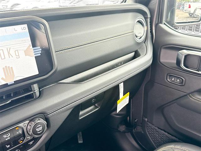 Photo of 2025 Granite Crystal Metallic Clearcoat Jeep Wrangler