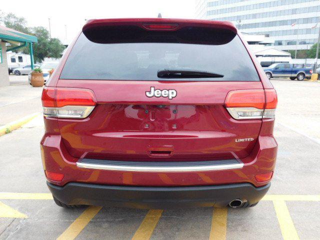 Photo of 2015 Deep Cherry Red Crystal Pearlcoat Jeep Grand Cherokee