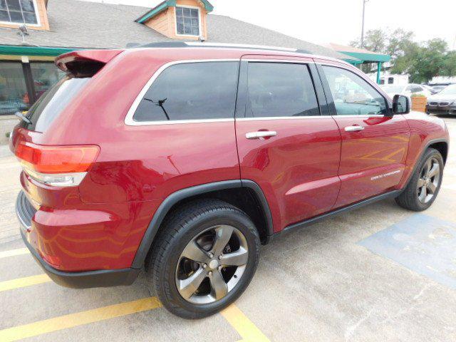 Photo of 2015 Deep Cherry Red Crystal Pearlcoat Jeep Grand Cherokee