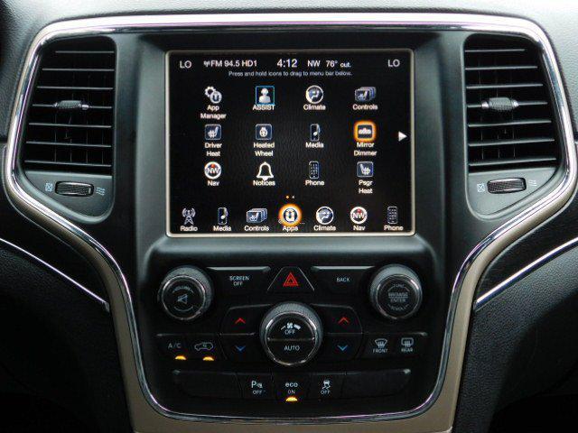 Photo of 2015 Deep Cherry Red Crystal Pearlcoat Jeep Grand Cherokee