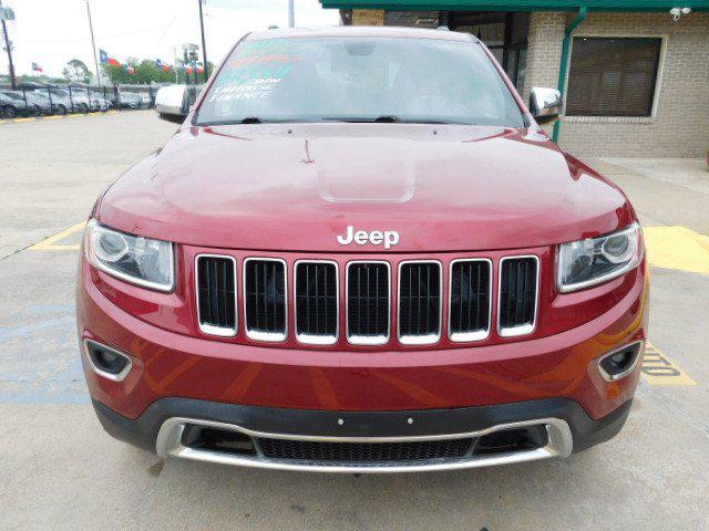 Photo of 2015 Deep Cherry Red Crystal Pearlcoat Jeep Grand Cherokee