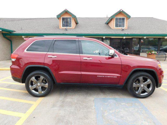 Photo of 2015 Deep Cherry Red Crystal Pearlcoat Jeep Grand Cherokee