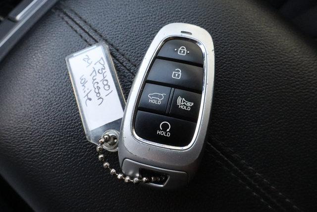 Photo of 2024 White Pearl Hyundai TUCSON