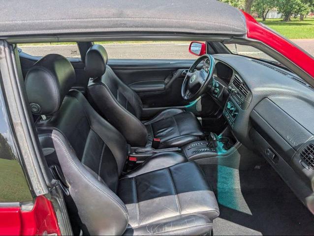 Photo of 2002 Red Volkswagen Cabrio