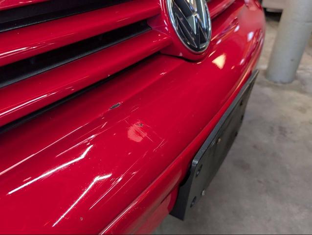 Photo of 2002 Red Volkswagen Cabrio