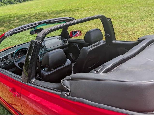 Photo of 2002 Red Volkswagen Cabrio