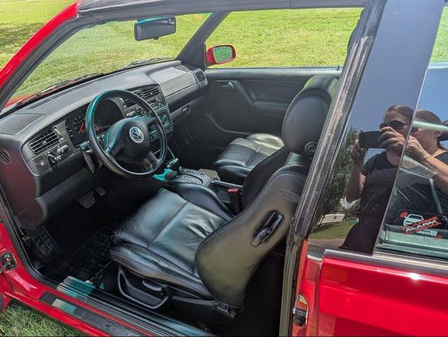 Photo of 2002 Red Volkswagen Cabrio