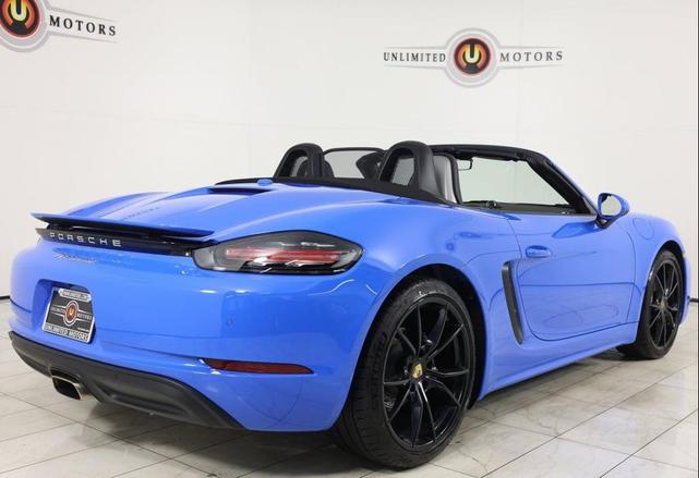 Photo of 2024 Shark Blue Porsche 718 Boxster