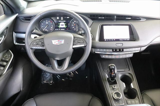 Photo of 2022 Crystal White Tricoat Cadillac XT4