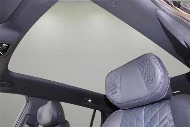 Photo of 2025 Black Raven Cadillac Escalade IQ