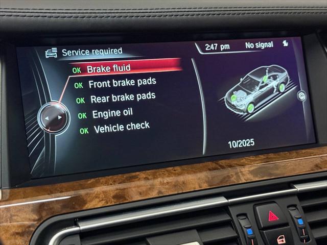 Photo of 2014 White BMW 750