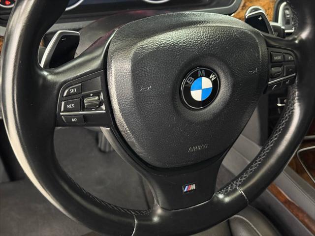 Photo of 2014 White BMW 750