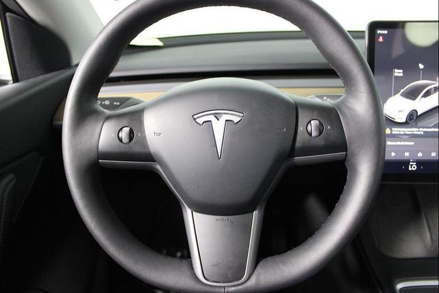 Photo of 2022 Pearl White Multi-Coat Tesla Model Y