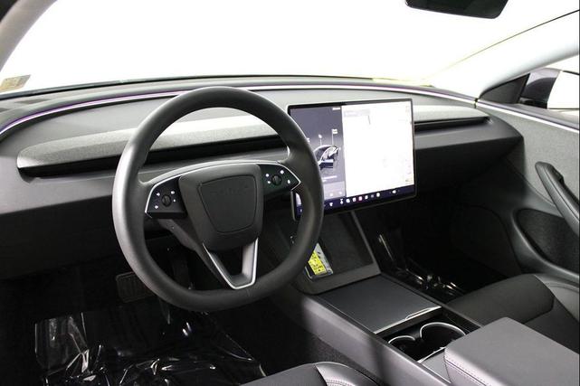 Photo of 2025 Black Tesla Model 3