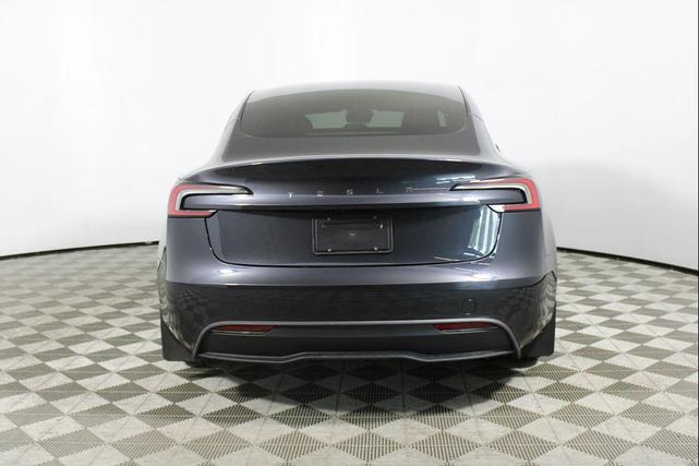 Photo of 2025 Black Tesla Model 3