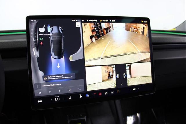 Photo of 2025 Black Tesla Model 3