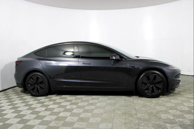 Photo of 2025 Black Tesla Model 3