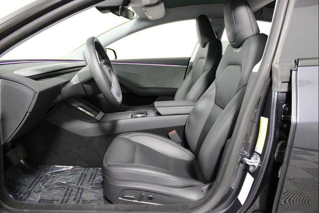 Photo of 2025 Black Tesla Model 3