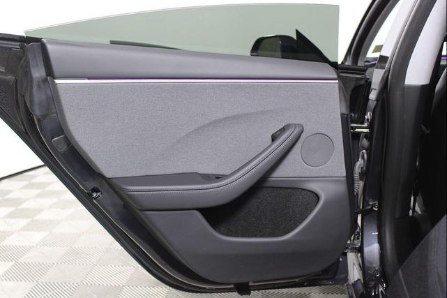 Photo of 2025 Black Tesla Model 3
