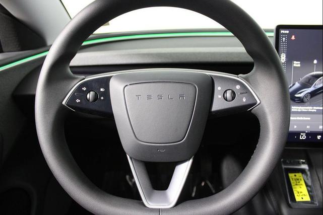 Photo of 2025 Black Tesla Model 3